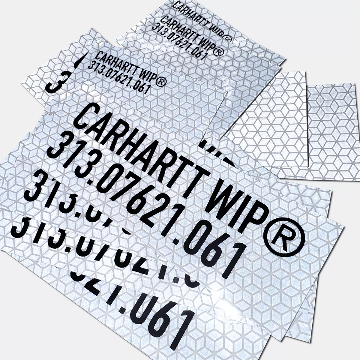 Carhartt WIP Tour Sticker Bag Reflective Grey Carhartt WIP Tour Sticker Bag Reflective Grey