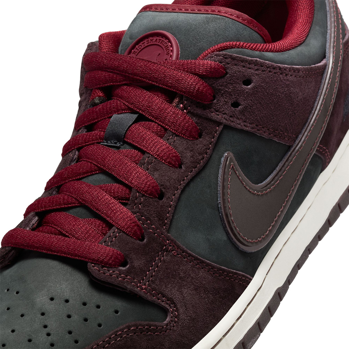 Nike SB x RIOT Skateshop Dunk Low Mahogany/Dark Beetroot/Team Red/Sail/Night Maroon Nike SB x RIOT Skateshop Dunk Low Mahogany/Dark Beetroot/Team Red/Sail/Night Maroon